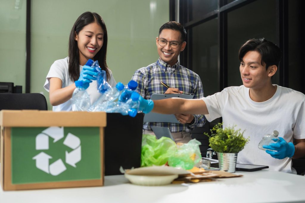 Business people working examining waste recyclable